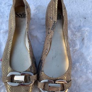 Tan/gray snake print slip ons.